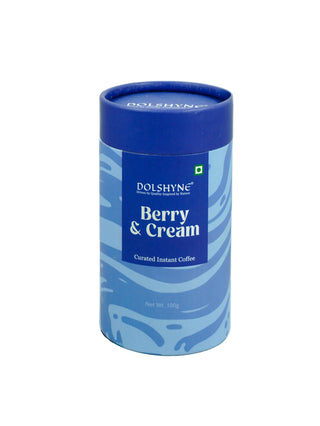 Blue cylindrical container of Dolshyne Berry & Cream instant coffee on a white background